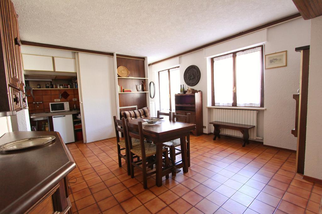 Hostdomus - Bi Level Apartment Pragelato Buitenkant foto